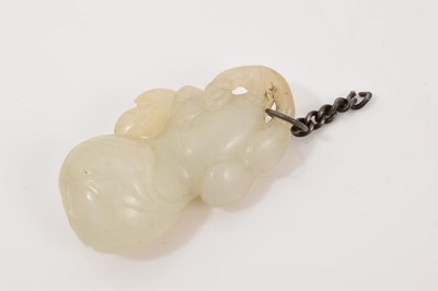 Lot 1089 - Chinese carved celadon jade or hardstone carved pendant in the form of a fruit