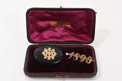 Lot 687 - Two Victorian mourning brooches