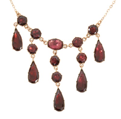 Lot 611 - Georgian 9ct gold and flat-cut garnet necklace in foil-backed gold collet setting