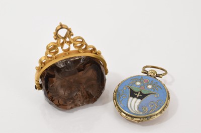 Lot 742 - Regency gilt metal enamel locket and antique smoky quartz three sides rotating seal (2)