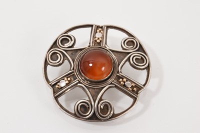 Lot 616 - Arts & Crafts silver and carnelian brooch in the style of Edward Spencer of the Artificers Guild