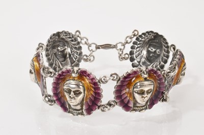 Lot 620 - 1920s/1930s silver and enamel bracelet with six Native American head panels