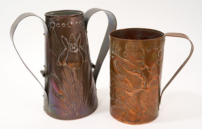 Lot 981 - Two similar Newlyn copper embossed vases