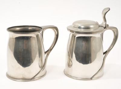 Lot 986 - Archibald Knox for Liberty Tudric lidded tankard. Model 066 and another