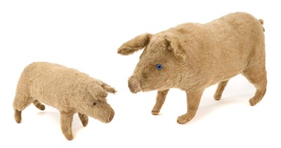 Lot 1012 - Antique Steiff pig, with blue glass eyes and button to the ear, and another