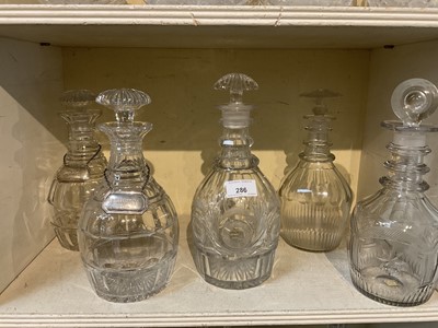 Lot 286 - Five Georgian cut glass decanters