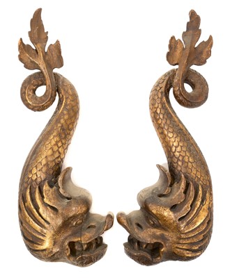 Lot 1024 - Pair of carved giltwood wall appliqués, of serpent form, 19th century or earlier, 41cm high