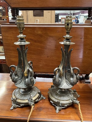 Lot 229 - Pair of antique metalware lamps