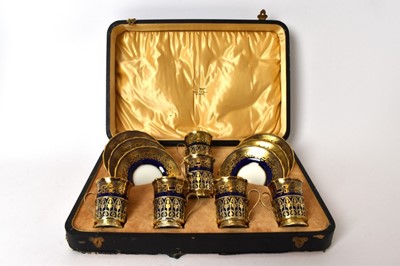 Lot 568 - Early 20th century Coalport coffee set with silver holders in fitted case.