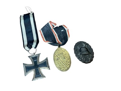 Lot 927 - First World War Imperial German Iron Cross (Second Class) together with two other Imperial German medals (3).