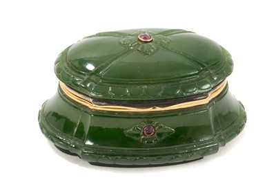 Lot 1049 - Fabergé style French nephrite jade box, of cushioned form, with gold mounts and inset rubies