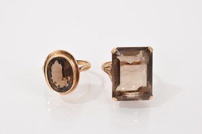 Lot 75 - Two 9ct gold mounted smoky quartz dress rings