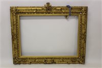 Lot 1560 - A Victorian gilt and gesso frame with heraldic...