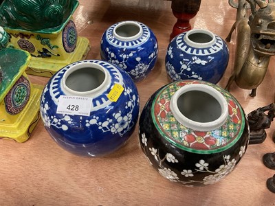 Lot 428 - Group of four antique Chinese prunus ginger jars, including three blue and white and one famille noire