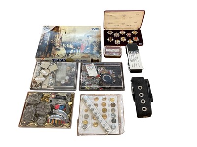 Lot 895 - Collection of Fire Service memorabilia to include trays of badges, buttons and belts, with listing of pieces within the collection.