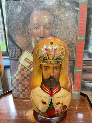 Lot 238 - Large 10 piece Russian nesting doll, together with a Russian iconography book