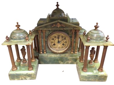 Lot 344 - Green onyx mantle clock garniture with gilt metal mounts