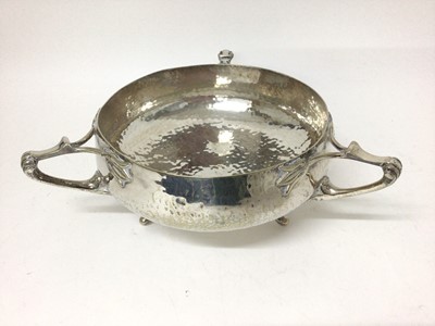 Lot 337 - Arts & Crafts silver plated three handled bowl with hammered finish