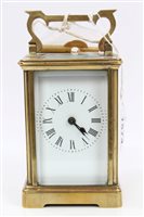 Lot 1574 - Early 20th century brass carriage Clocksck...