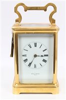 Lot 1577 - Edwardian gilt brass carriage Clocksck with...