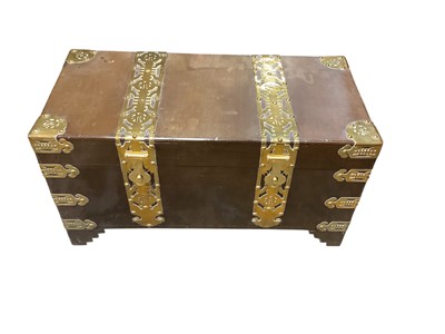 Lot 1642 - Oriental brass bound teak trunk