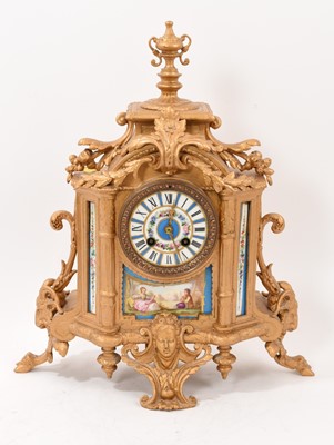 Lot 862 - Late 19th century French porcelain and gilt metal clock with painted decoration.