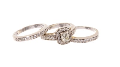 Lot 708 - Diamond cluster ring and pair of half eternity rings