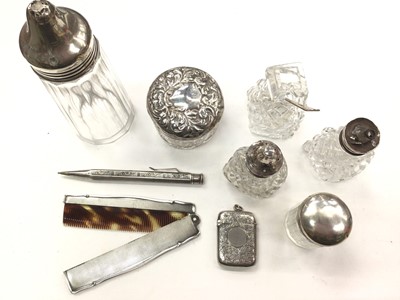 Lot 1064 - Group of silver topped glass jars/bottles, silver vesta case, silver (835) pencil and folding comb