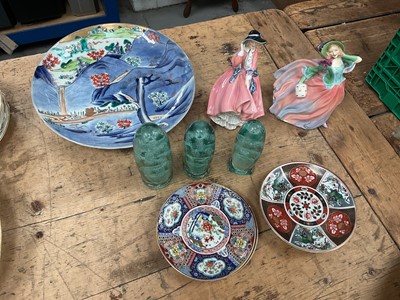 Lot 29 - Two Royal Doulton figurines, three Victorian glass dumpy weights, an antique Japanese Arita dish and four other small Japanese dishes