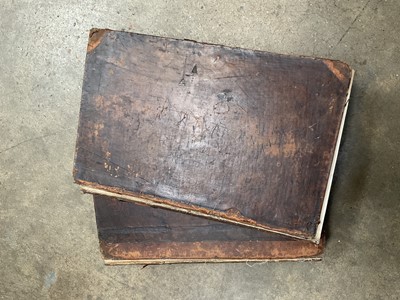 Lot 152 - Two early leather bound bibles