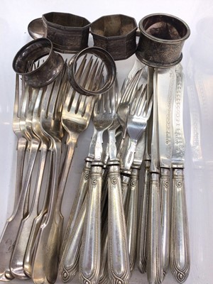 Lot 1114 - Four silver napkin rings, one other and some plated cutlery