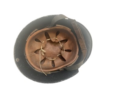 Lot 733 - Nazi M34 pattern Fire Police helmet with original aluminium comb, black painted finish with two decals (de-nazified), leather liner and chinstrap.