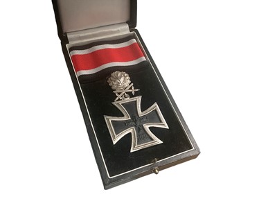 Lot 744 - German Knights Cross of the Iron Cross with oak leaves and swords 1957 redesign, cross marked 925, in presentation box.