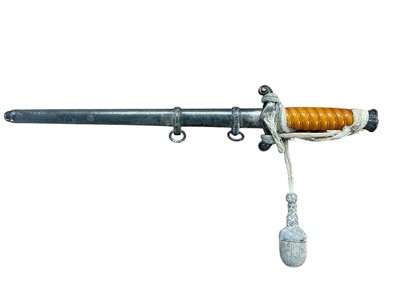 Lot 988 - Nazi Wehrmacht 1935 pattern officers' dress dagger with silver plated pommel and crossguard, orange celluloid grip, plain blade, by Eickhorn Solingen in scabbard.
