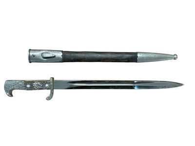 Lot 987 - Nazi Police Bayonet, with polished steel blade by Carl Eickhorn, Solingen, two piece horn grip and eagles head pommel, in leather scabbard with nickel plated mounts.