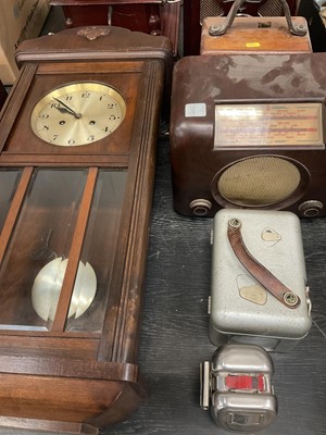 Lot 143 - Vintage hanging wall clock, radios and pigeon clocks