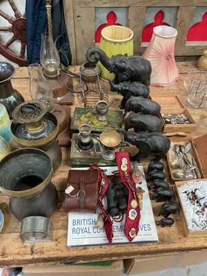 Lot 35 - Sundry items, including copper lamps, family of ebony elephants, enamel bowls badges, etc