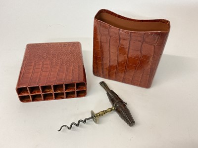 Lot 25 - Crocodile cigar holder for 12 cigars and corkscrew (2)