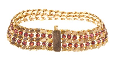 Lot 667 - Continental gold and garnet bracelet