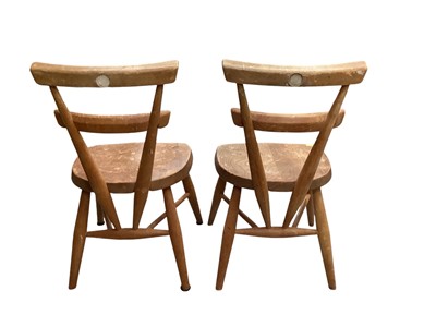 Lot 1220 - Pair of Ercol elm children's chairs