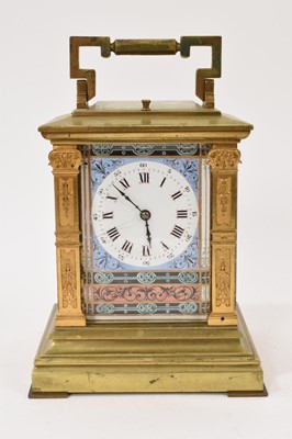 Lot 857 - Late 19th century French carriage clock with repeating movement and polychrome enamel dial in brass case