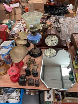 Lot 425 - Oil lamp with Vaseline glass shade, two sets of vintage kitchen scales, mantel clock, mirror and trays.