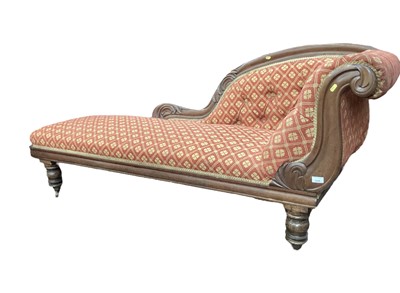 Lot 1250 - Victorian mahogany framed chaise longue with red and gold upholstery on turned legs and castors