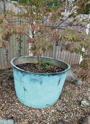 Lot 1664 - Very large revited copper vessel, approximately 110cm diameter