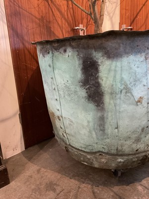 Lot 1664 - Very large revited copper vessel, approximately 110cm diameter