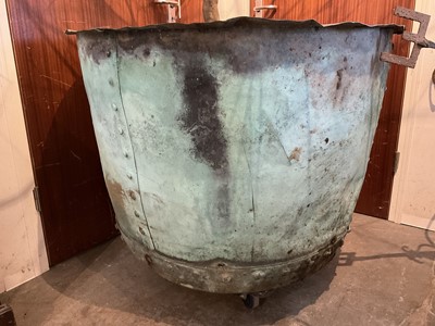 Lot 1664 - Very large revited copper vessel, approximately 110cm diameter