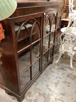 Lot 1254 - Georgian mahogany bookcase with shelved interior enclosed by two Gothic astragal glazed doors, 127cm wide, 36cm deep, 133cm high