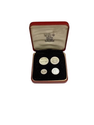 Lot 425 - G.B. - Elizabeth II four coin Maundy set 2001 UNC cased and two leather purses of issue (1 coin set)