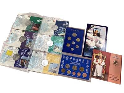 Lot 431 - World - Mixed brilliant uncirculated flatpacks to include issues from Guernsey, Ireland, Isle of Man, Falkland Islands, Gibraltar & others to include G.B. Royal Mint Ten Pence alphabet set x...