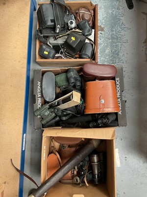 Lot 97 - Three boxes of binoculars, cameras, and a telescope, including a pair of Carl Zeiss Jenoptem 10x50 binoculars in case